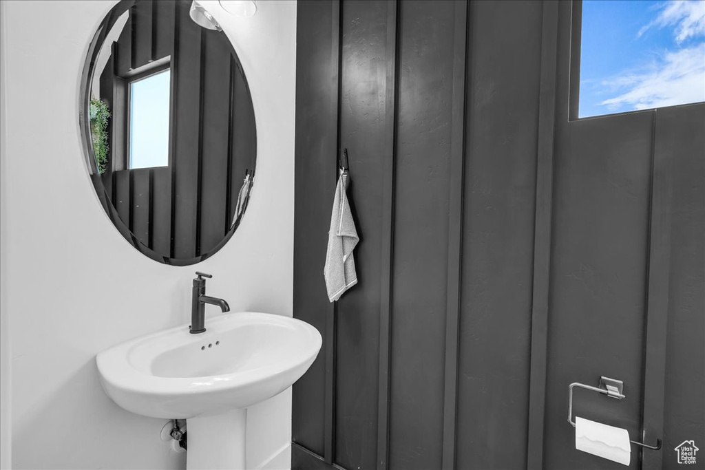 Bathroom with plenty of natural light and a sink