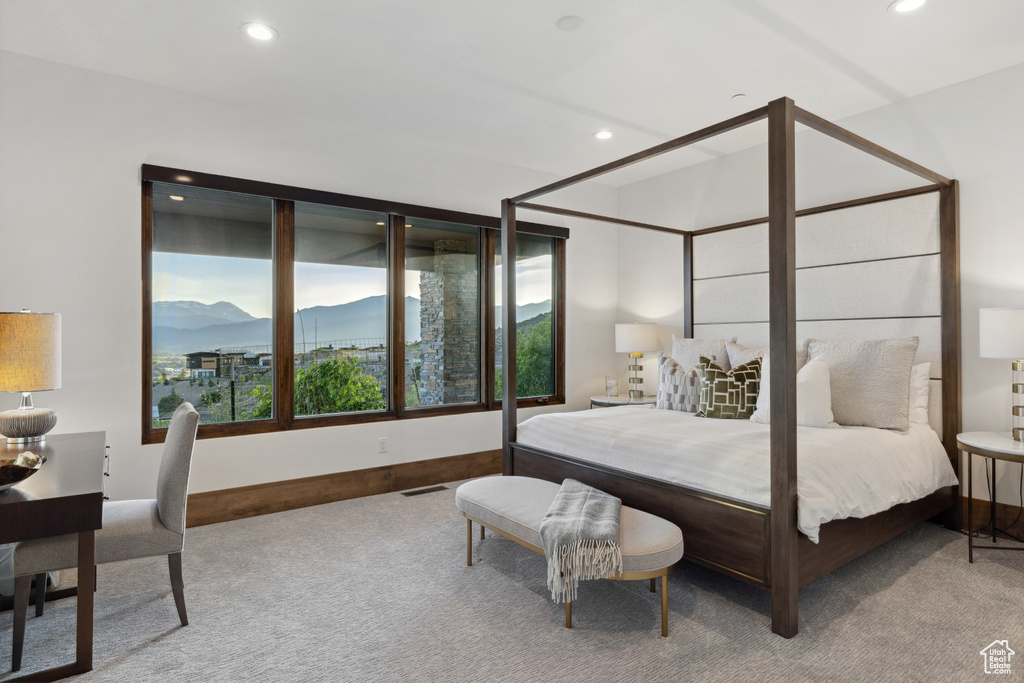 Bedroom featuring carpet, a mountain view, recessed lighting, and baseboards