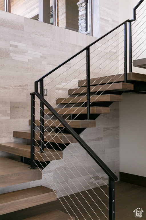 Stairway with wood finished floors