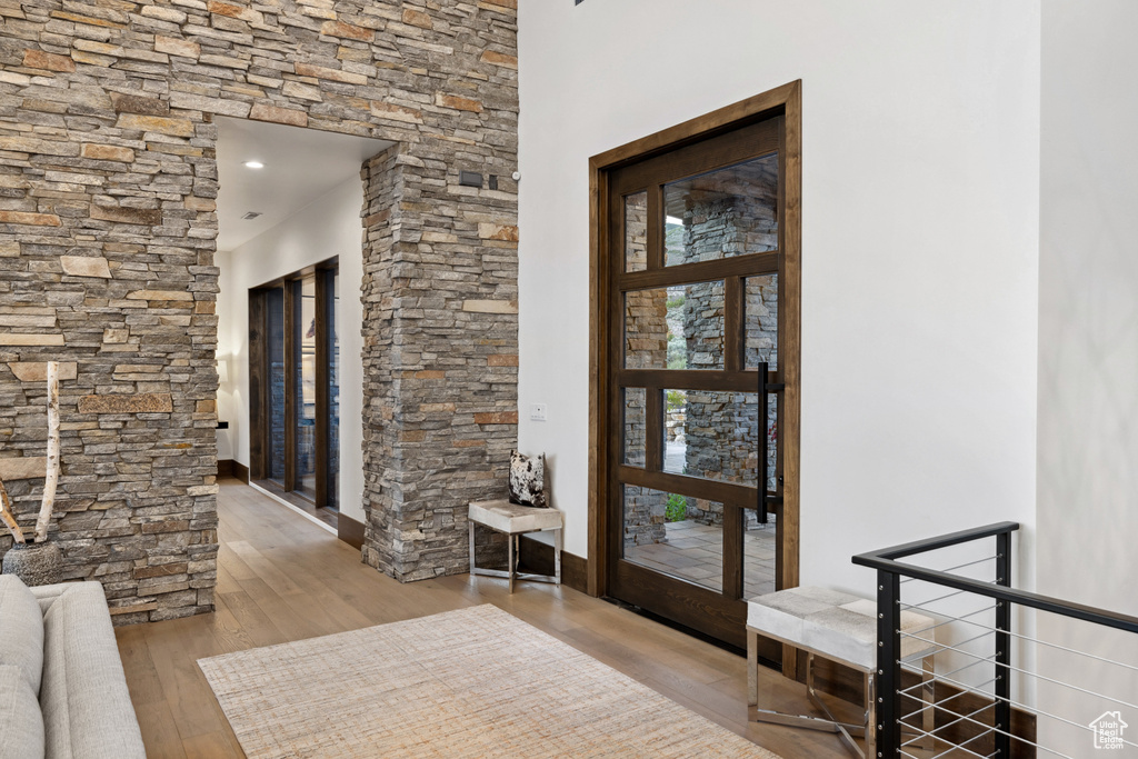 Foyer entrance featuring wood-type flooring