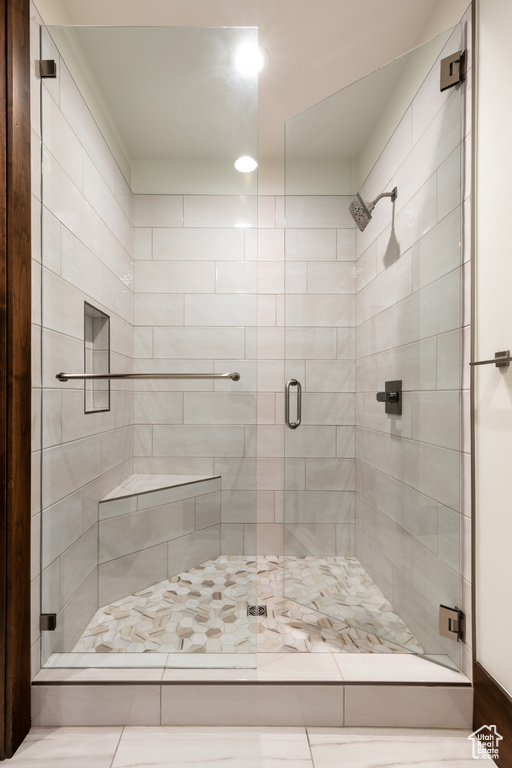 Full bathroom featuring a stall shower and recessed lighting