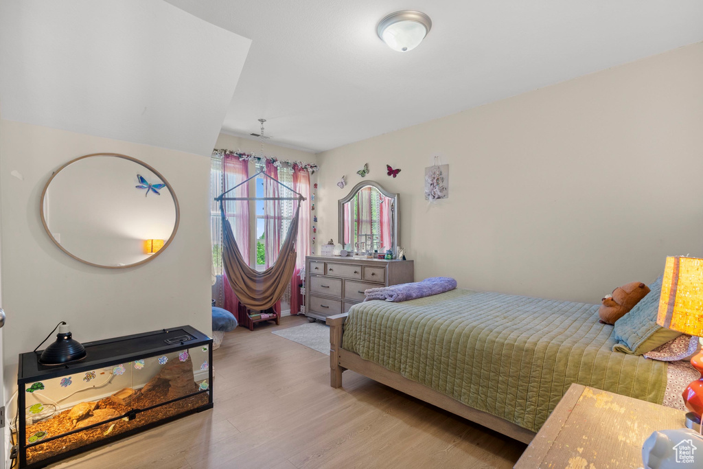 Bedroom featuring wood finished floors