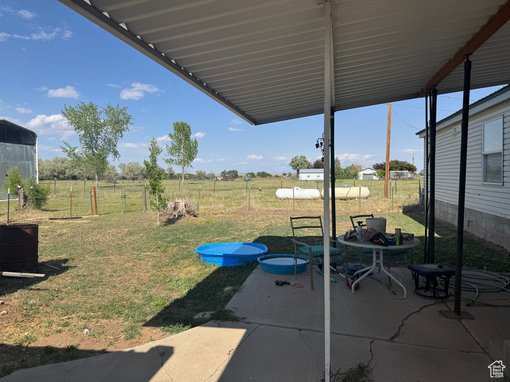 View of yard with a patio area