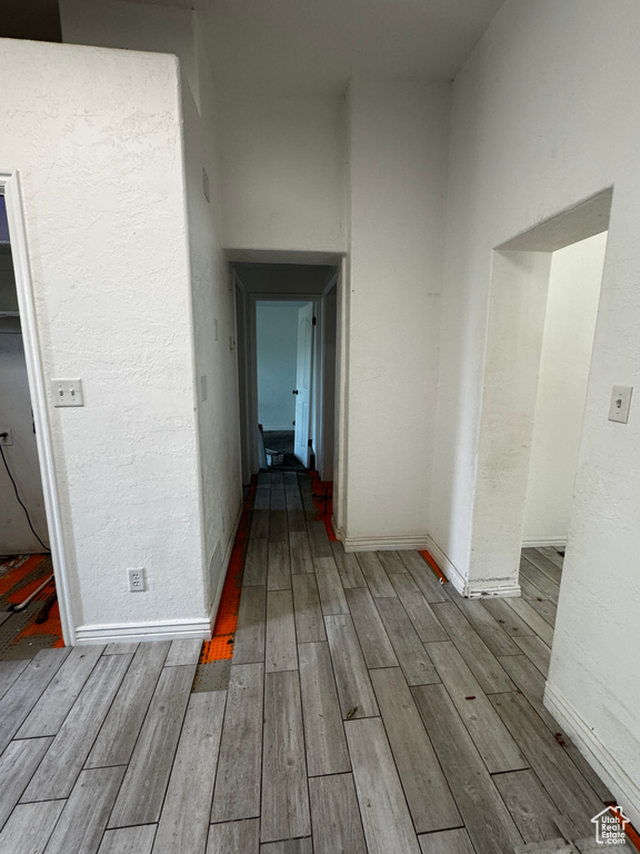 Hall with wood finished floors