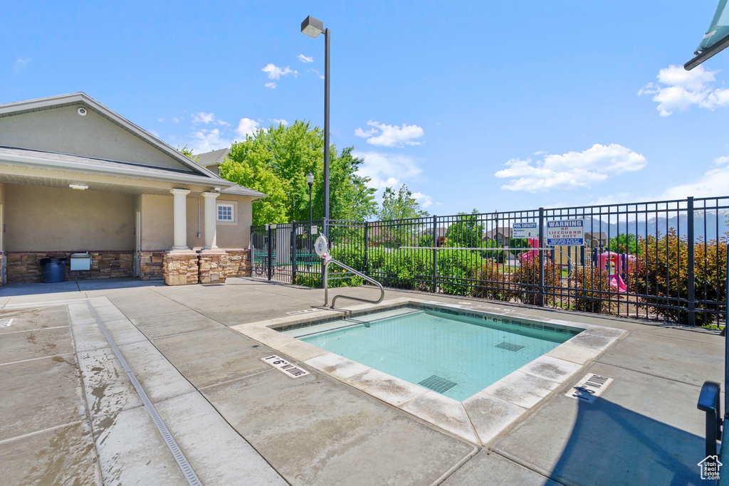View of pool with a patio area and a pool