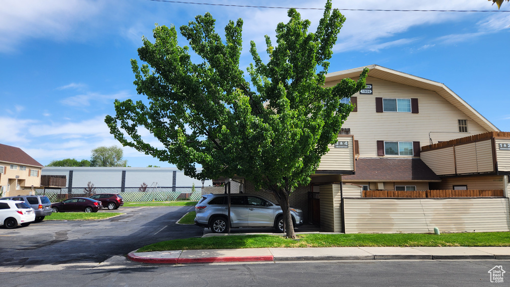 View of front of home featuring uncovered parking