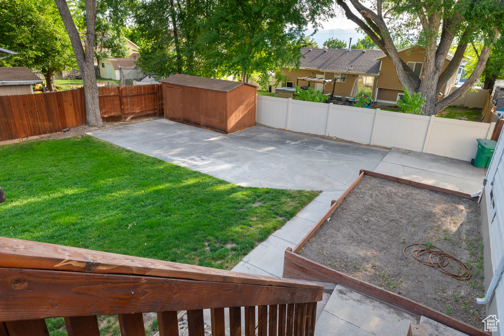 View of yard with a patio and a residential view