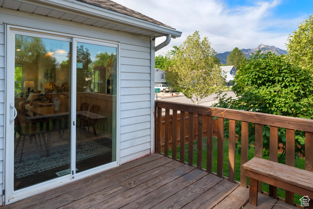 Wooden deck featuring a mountain view