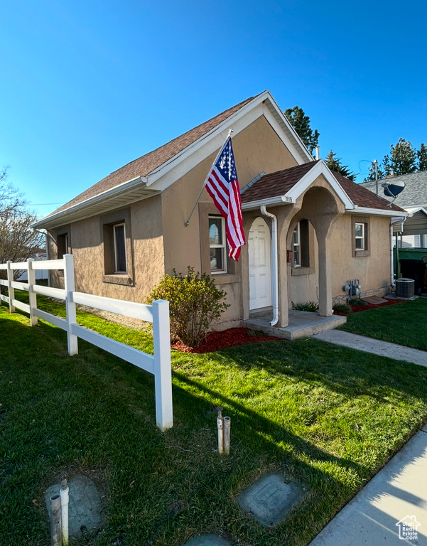 Ranch-style home featuring stucco siding