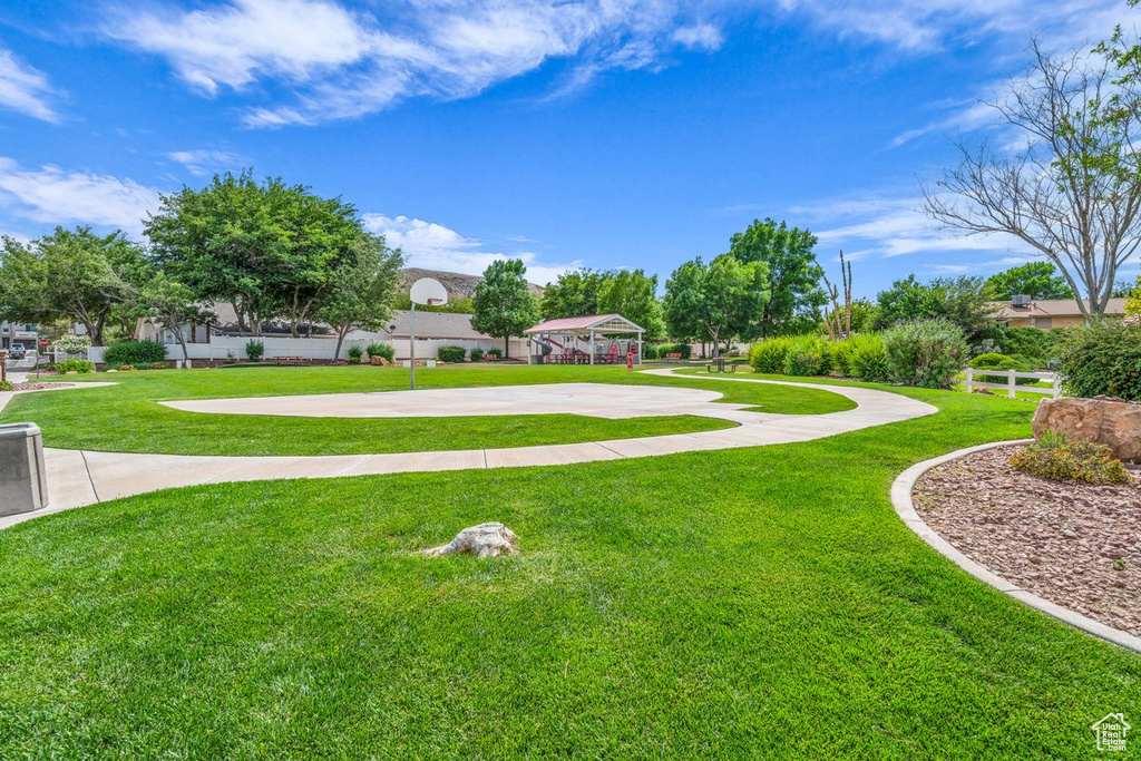 Surrounding community featuring a gazebo and community basketball court