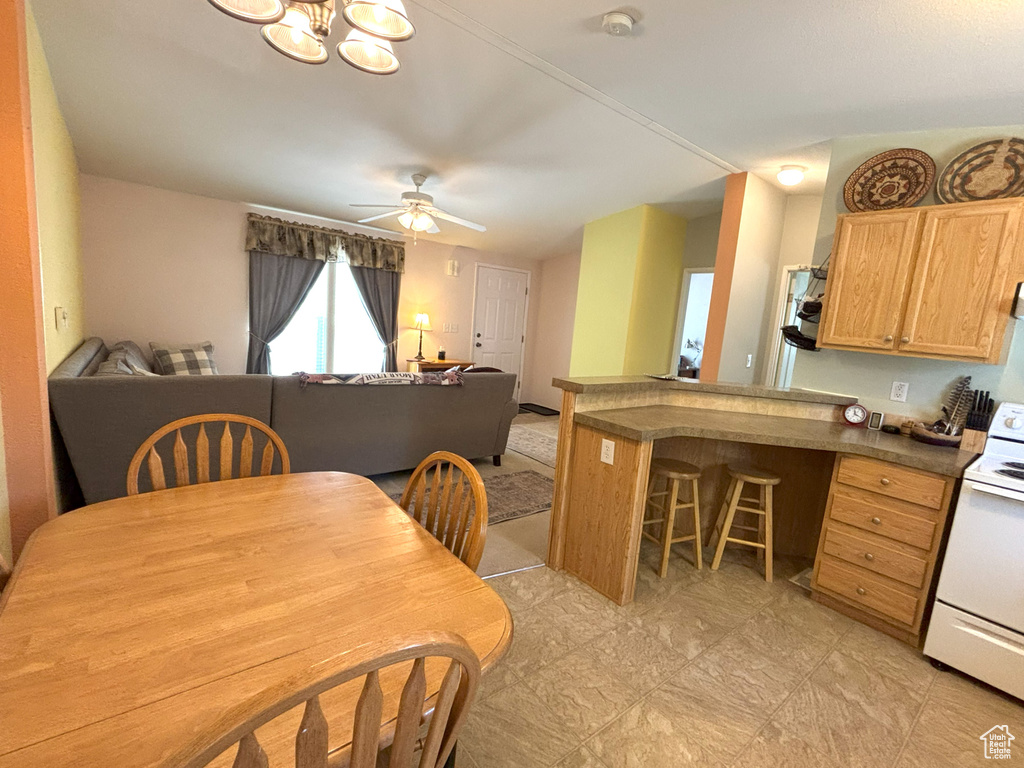 Dining space with a ceiling fan