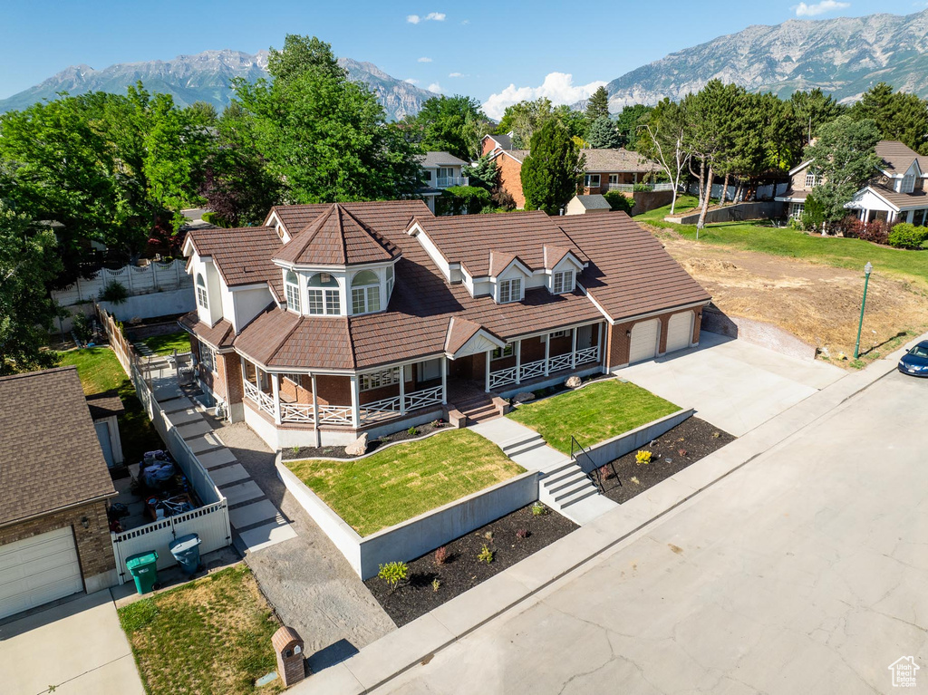 Aerial view of residential area with a mountain backdrop