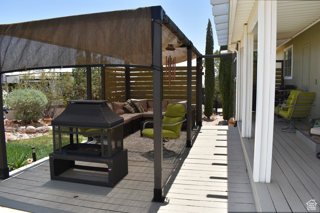 Wooden terrace with outdoor lounge area