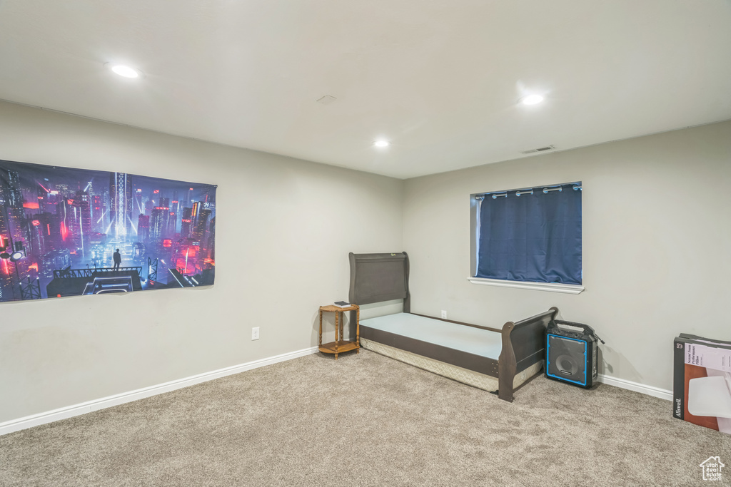 Unfurnished bedroom with carpet floors, recessed lighting, and baseboards
