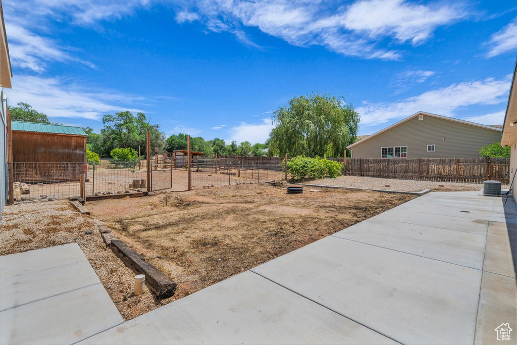 View of yard with a patio area