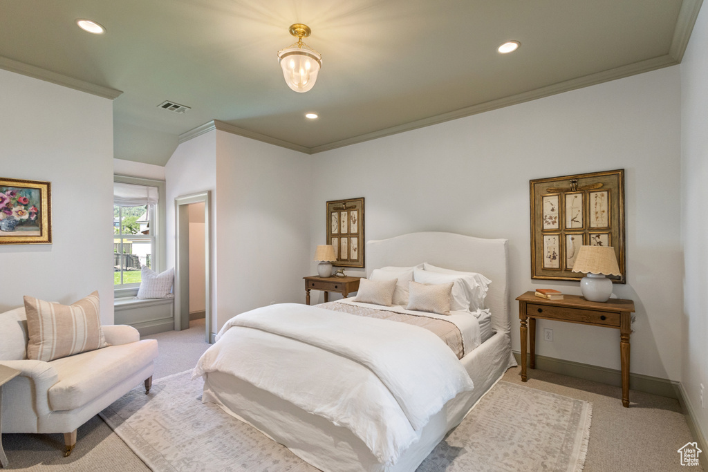 Bedroom with crown molding, light carpet, recessed lighting, and baseboards