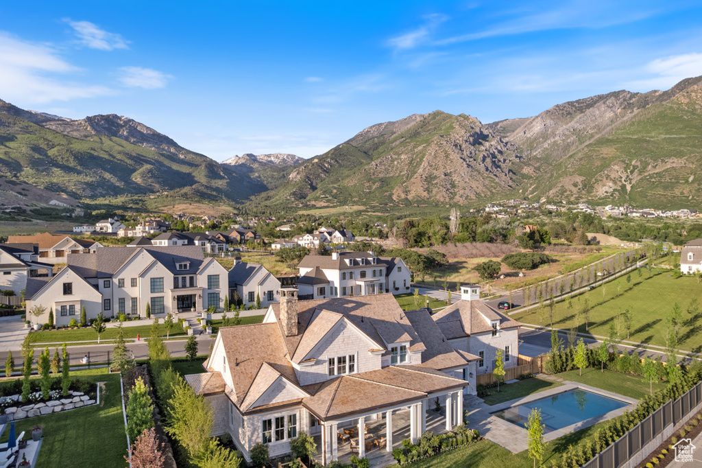 View of mountain backdrop with nearby suburban area