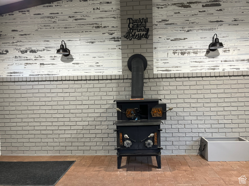 Detailed view of a wood stove and wood walls