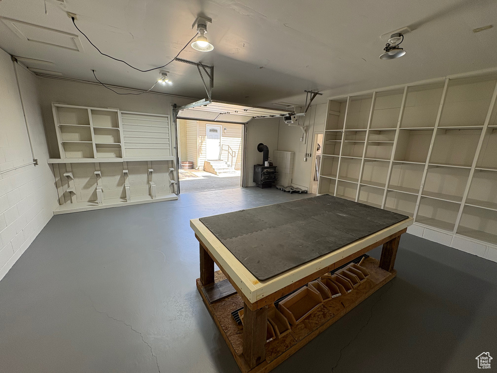 Garage featuring a wood stove