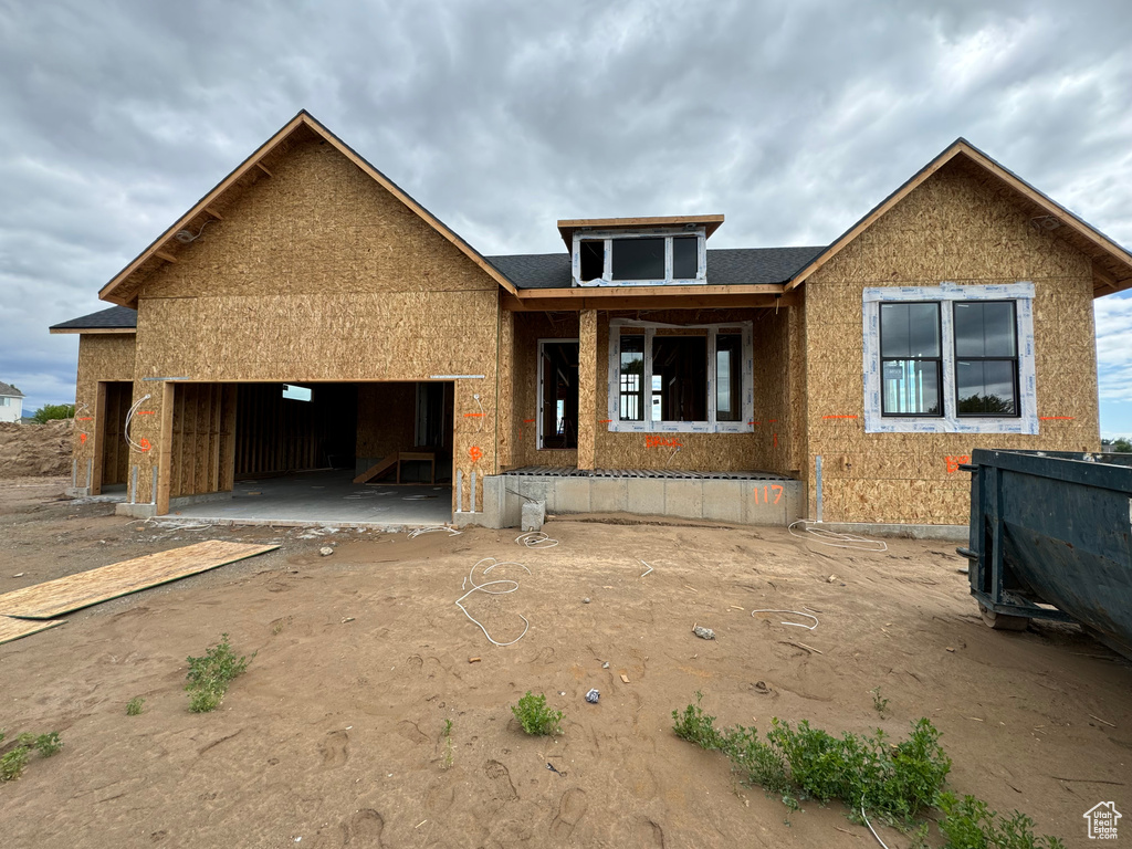Property under construction featuring a garage
