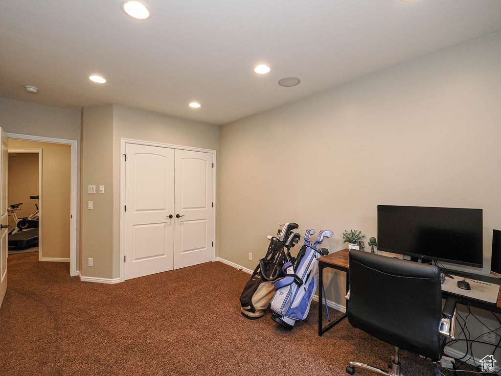 Carpeted office featuring recessed lighting and baseboards