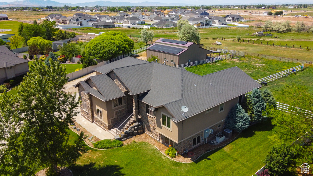 Aerial view of residential area featuring a mountain backdrop