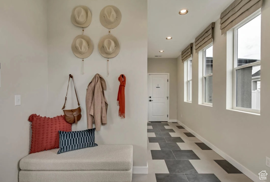 Mudroom with baseboards, recessed lighting, and tile patterned floors
