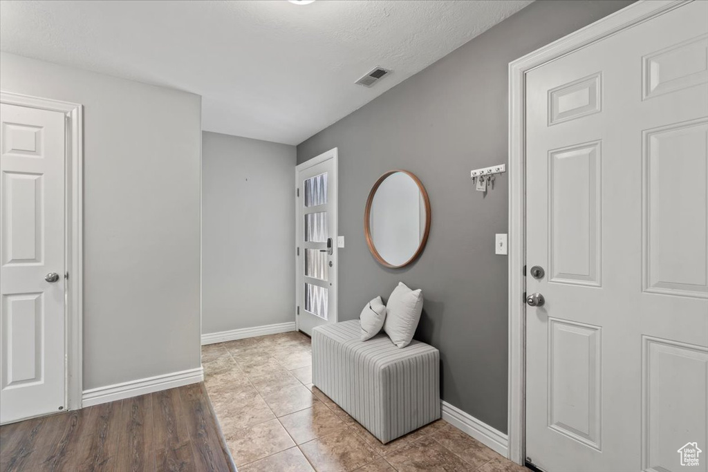 Foyer featuring baseboards