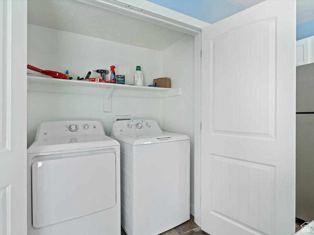Washroom featuring washer and dryer