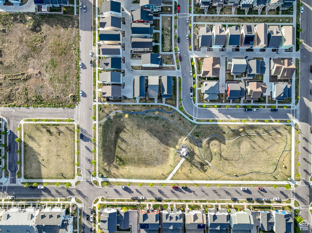 Aerial perspective of suburban area featuring property parcel outlined