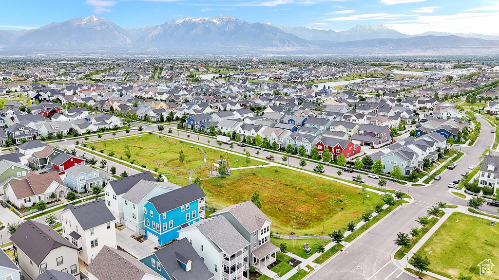 Aerial view of residential area with a mountainous background
