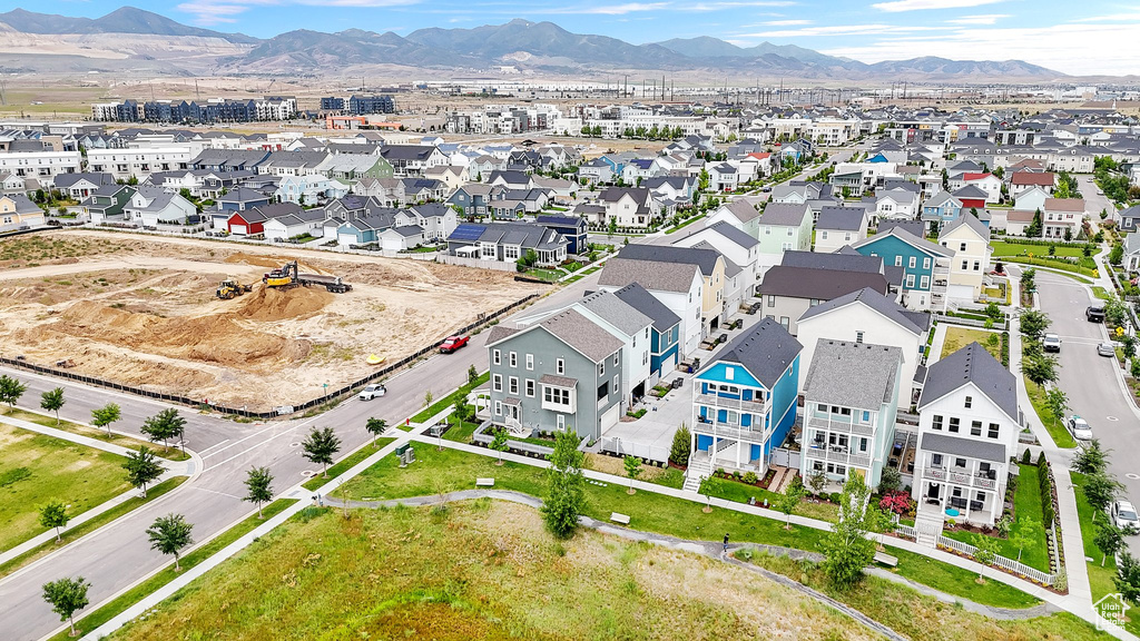 Aerial view of residential area featuring mountains