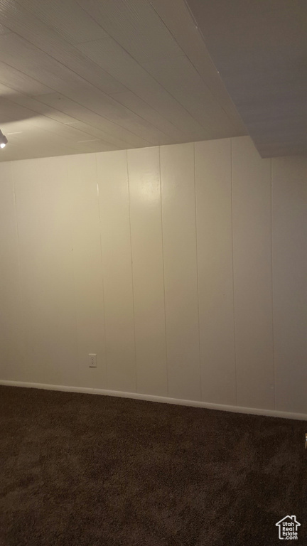 Unfurnished room featuring carpet