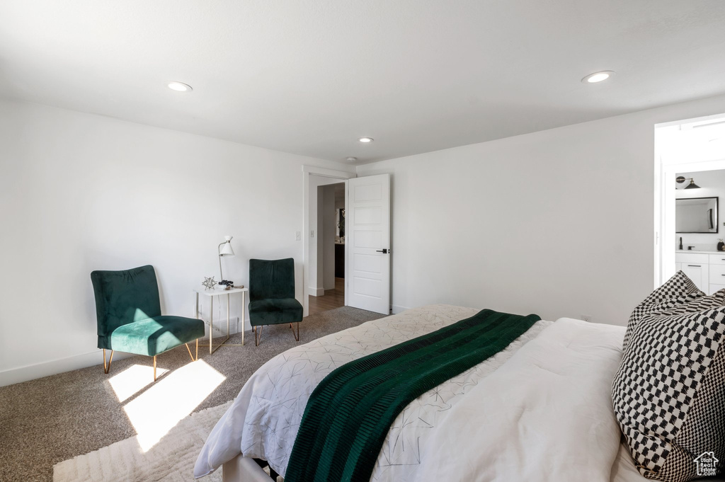 Carpeted bedroom featuring recessed lighting and baseboards