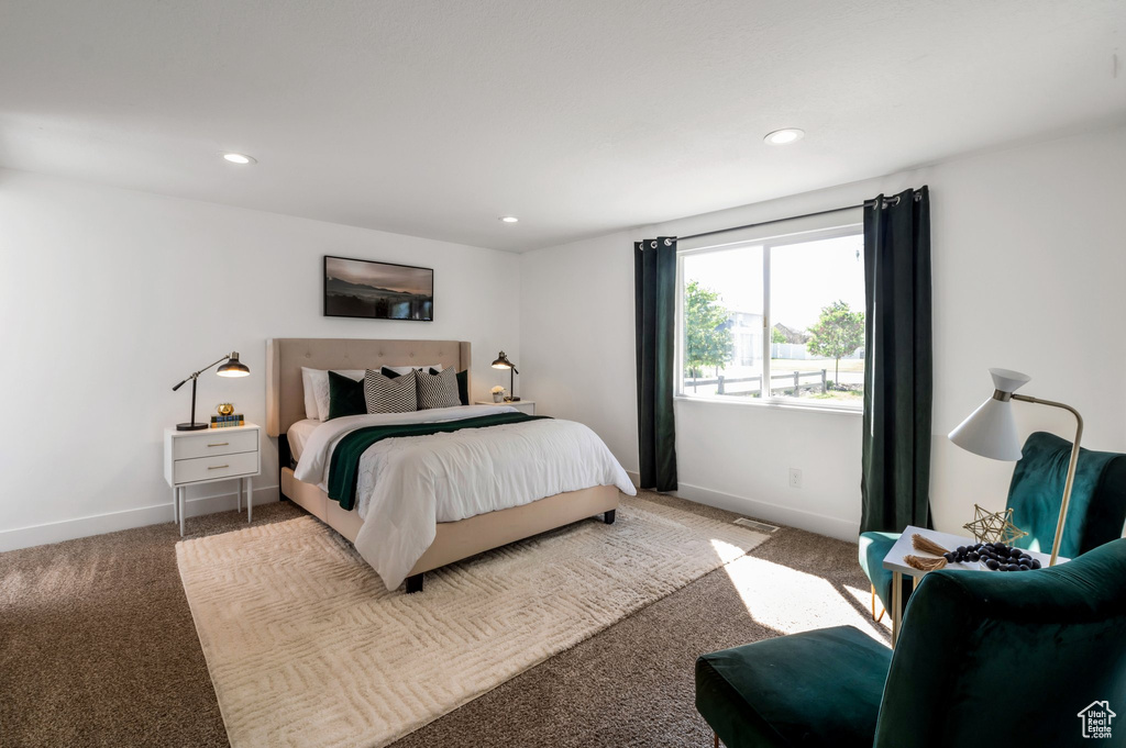 Bedroom featuring carpet, baseboards, and recessed lighting