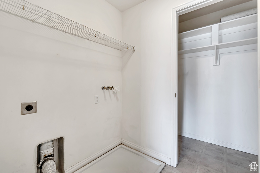 Laundry area featuring hookup for an electric dryer