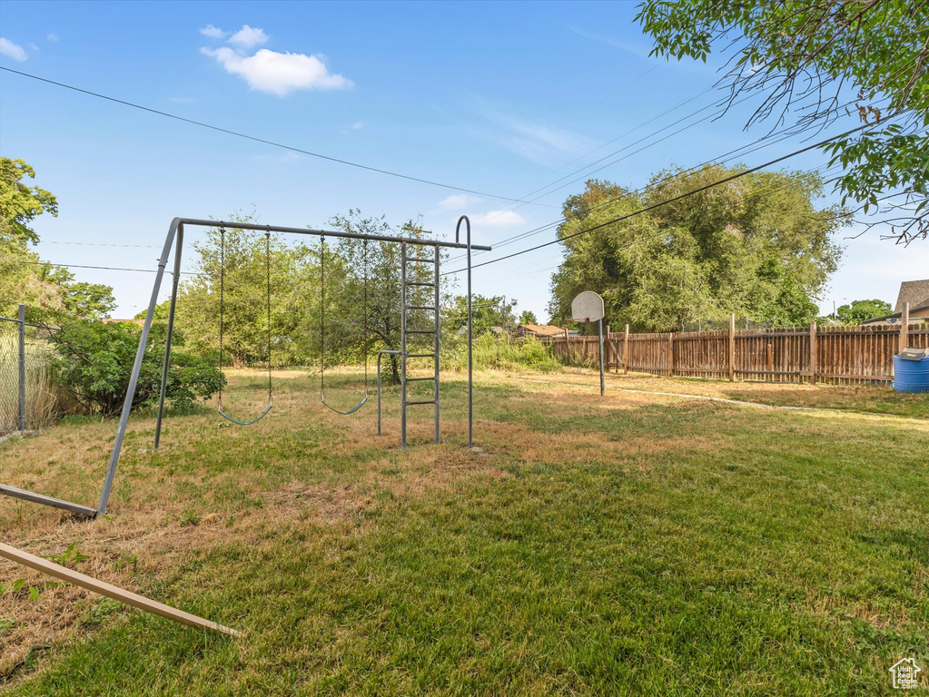 View of yard with a playground