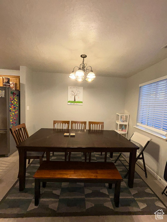 Dining space with a chandelier