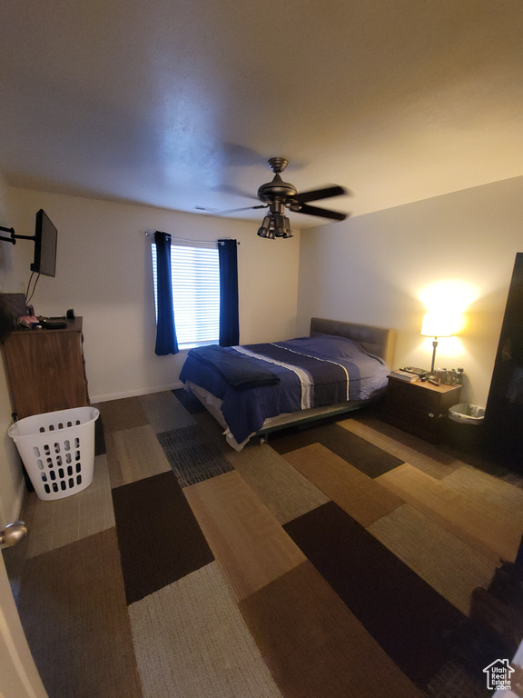 Bedroom featuring carpet flooring and a ceiling fan