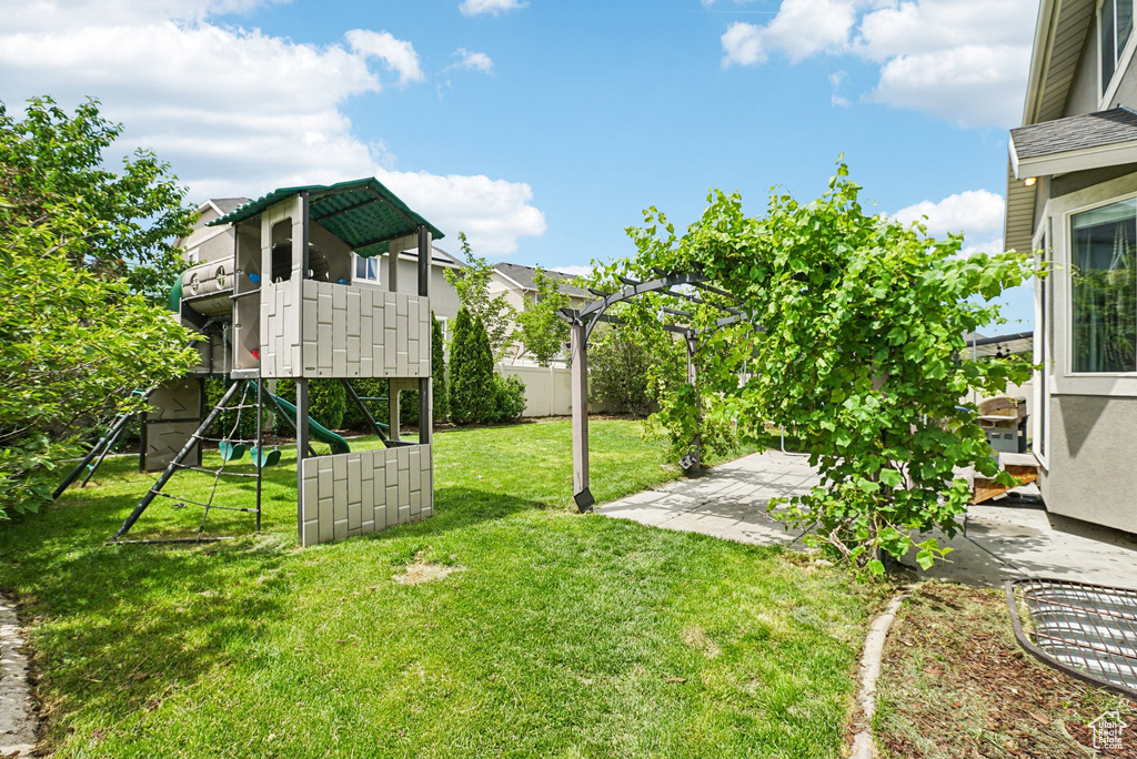 View of yard with a patio area