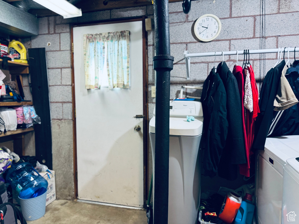 Interior space with washer and clothes dryer