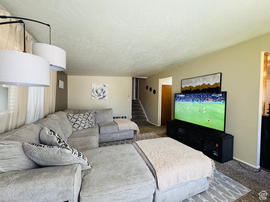 Bedroom with carpet floors and baseboards