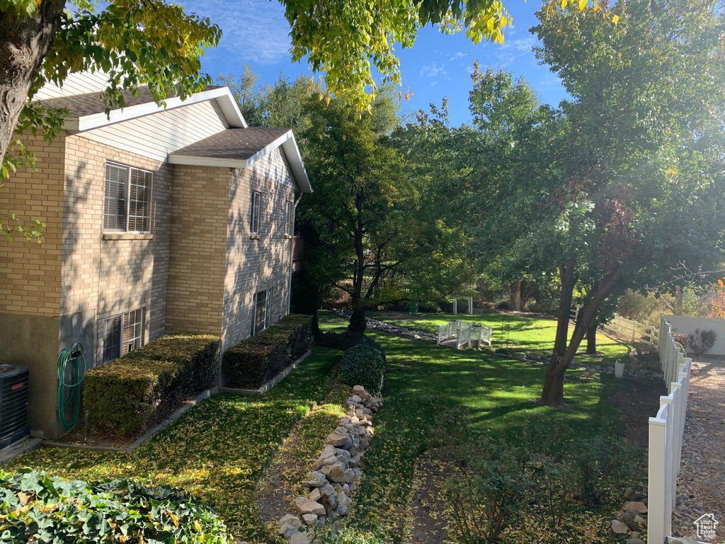 View of yard featuring central air condition unit