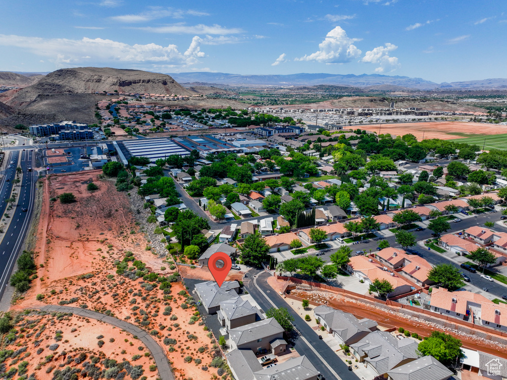 Aerial view of residential area with mountains