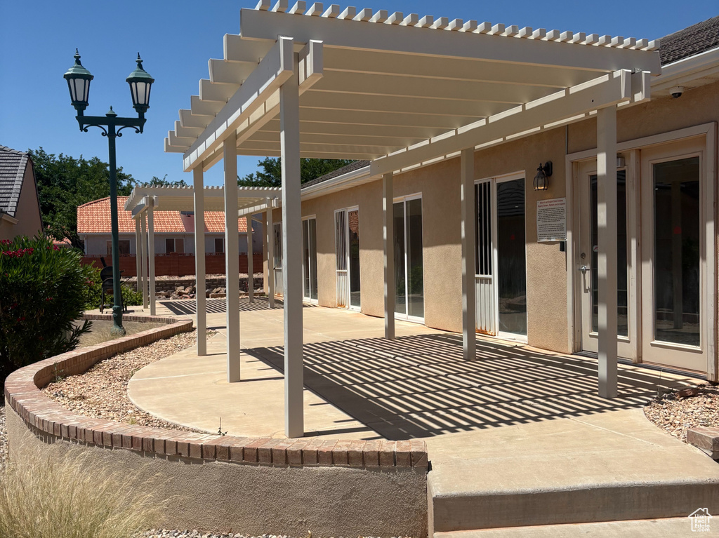 View of patio with a pergola