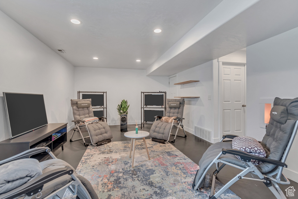 Living room featuring recessed lighting and baseboards
