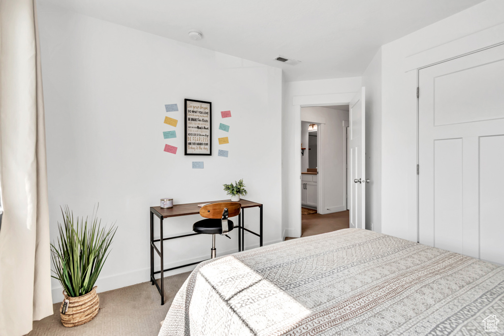 Bedroom with carpet floors