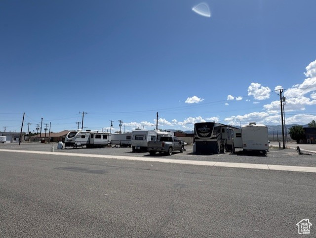 View of asphalt street with sidewalks