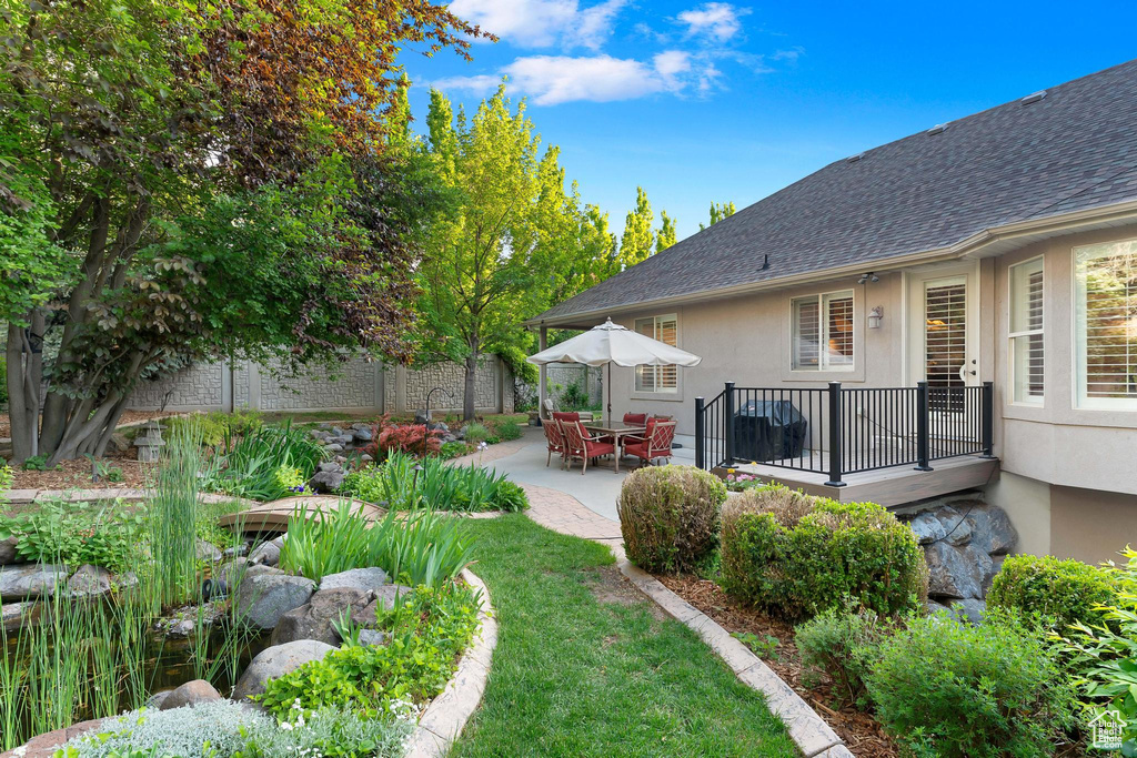 View of yard with a patio area