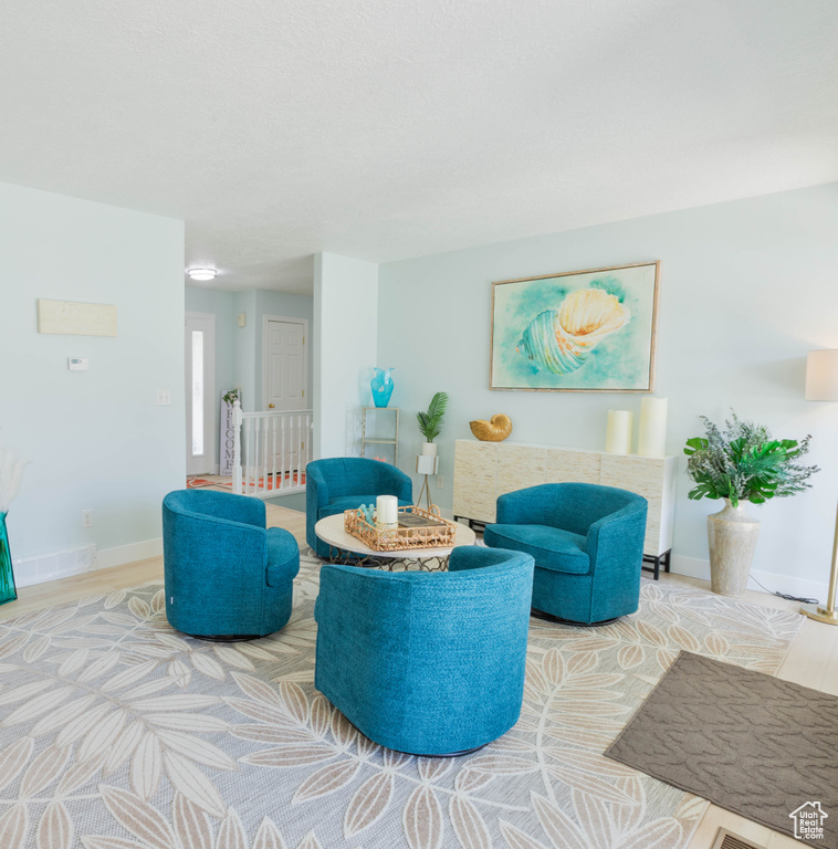 Living area featuring baseboards